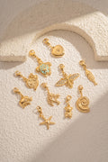 Set mit 10 goldfarbenen Edelstahlanhängern – Meeresmotive