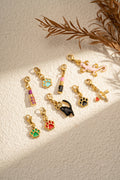 Set mit 9 bunten, lustigen Modeschmuck-Anhängern aus vergoldetem Edelstahl